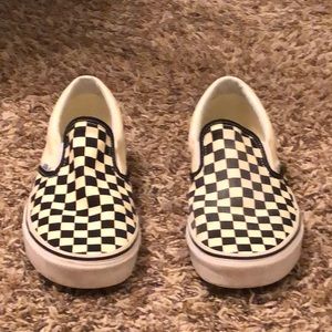 Black and white checkered slip on vans
